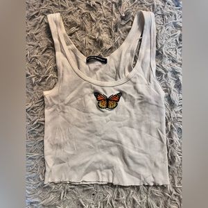 Brandy Melville cropped white butterfly tank top
